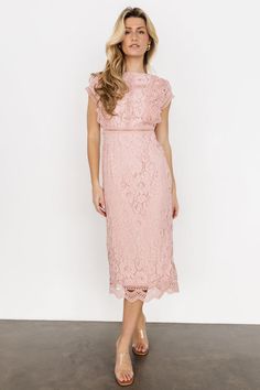 Get yourself a classy lace midi dress. Our Nessa Lace Midi Dress has cute ruffles and a round neckline! Chic Pink Lace Midi Dress, Elegant Pink Lace Midi Dress, Pink Lace Trim Midi Dress For Wedding, Pink Lace Midi Dress For Wedding Guest, Pink Sheath Dress With Ruffles, Feminine Pink Midi Dress With Lace Trim, Elegant Pink Dress For Brunch, Pink Sheath Dress For Wedding Guest, Chic Blush Midi Dress