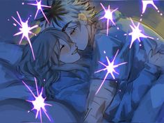 two people laying in bed with stars on them