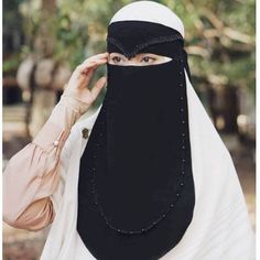 Bismillaahirrahmaanirrahiim Details : -Only niqab, without veil / hijab 🌸material siffon silky, jetblack 🌸 neat stitches 🌸 The length of the niqob covers the chest (length ± 45 cm/ 17,72 inches. width ± 35 cm/ 13,78 inches) 🌸 comfortable to use, Insha Allah 🌸niqob best seller 20% of the proceeds from the sale will be donated to the construction of a Tahfidz Quran school and the poor in Indonesia (hope you don't mind), Jazaakillaahu khoir. Note : Please include your mobile number and email ( Black Khimar For Wedding And Eid, Black Hijab, Niqab, Lace Flowers, Nun Dress, Veil, Beautiful Flowers, Chiffon, Womens Dresses