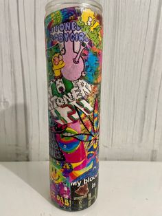 a glass with some graffiti on it