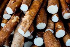 several sticks with white dots on them are stacked up in a pile and ready to be used for cooking