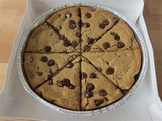 a chocolate chip cookie in a pan on a table