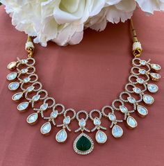 Exquisite tyaani inspired uncut polki necklace set. #statementjewelry #fashion #trendy #weddingseason #jewelry #weddingjewelry #fashionjewelry #kundanjewelry #punjabiwedding #indianwedding #diljitdosanjh #punjabijewelry #india #pakistan #canada #vancouver #toronto #brampton #usa #california #bayarea #sanfrancisco #texas #dallas #houston #newyork #chicago #sanantonio #florida #gehnagalleryusa Designer Kundan Bridal Necklace With Intricate Design, Designer Kundan Temple Necklace With Chandbali Shape, Designer Kundan Jewelry With Gota Work, Kundan Jewelry With Gota Work For Designer Wear, Bollywood Style Kundan Temple Necklace For Designer Wear, Bollywood Style Kundan Temple Necklace, Designer Kundan Hand Set Necklaces, Kundan Temple Jewelry Necklace For Designer Wear, Kundan Temple Jewelry Necklaces For Designer Wear