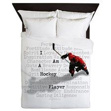 a bed with a hockey player on it