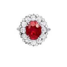 METAL SPECIFICATIONS Metal Name: White Gold 14K STONE SPECIFICATIONS Stone Name: RUBY /DIAMOND Stone Cut : Oval, Round & Pear cut Stone Specifications: There is one ruby in the center of approx. 13.75 carat & approx. 4.00 carats of smaller round diamonds on the side. Natural earth mined stones. Total Stone Weight : approx. 17.75 carats Color : Red/F Clarity : AAA/VS1 RING SPECIFICATIONS Appraised Value : $28288.00 Comes with a FREE APPRAISAL Ring Size : 6.5 (Can ship in any size you want Winter Planner Stickers, Ruby Ring Vintage, Ruby Ring Gold, Colored Stone Rings, Pear Cut Diamond, Ruby Jewelry, I Love Jewelry, Ruby Diamond, Red Stone