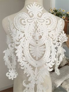 Sales details: This is a High quality elegant Lace Applique made by rayon, which is good for wedding dress designs or alterations. Simply place it on a wedding or prom dress bodice, creating a rich pattern that is both glamorous and elegant.This piece is a full bodice applique. Add to your perfect gown or create your own gorgeous dress with this glamorous piece. Size: About 23.22 x 14.56 inches/ 59 cm x 37 cm Color: off-white as in picture Material: Rayon About Shipping: We are transported of ch Illusion Bridal Gown, Large Embroidery, Bodice Applique, Tulle Embroidery, Applique Wedding, For Wedding Dress, Applique Wedding Dress, Applique Dress, Ivory Wedding