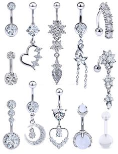 an assortment of dangling belly rings with various designs and shapes on each one, all in different styles