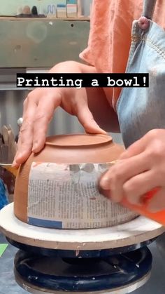 a person is making a bowl out of clay with the words printing a bowl on it