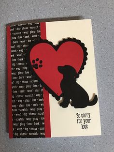 a card with a dog and a heart shaped paper cutout that says sorry for your kids