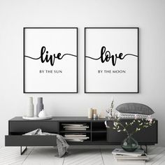 two black and white posters with the words live by the sun, love by the moon