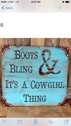 a wooden sign that says boots and bling it's a cowgirl thing