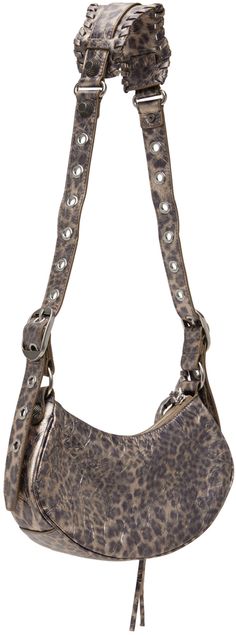 Crinkled Arena lambskin shoulder bag in tones of metallic brown. · Studs and leopard pattern printed throughout · Adjustable and detachable shoulder strap · Gathering and pin-buckle detailing at face · Detachable graphic mirror charm at side · Zip closure · Cotton canvas lining · Antiqued silver-tone hardware · H5 x W9.5 x D2.5 Supplier color: Brown Balenciaga Le Cagole Rhinestone, Leopard Pattern, Small Bag, Side Zip, Antique Silver, Cotton Canvas, Balenciaga, The Face, Print Patterns