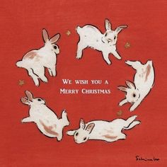 a group of rabbits sitting in a circle with the words we wish you a merry christmas