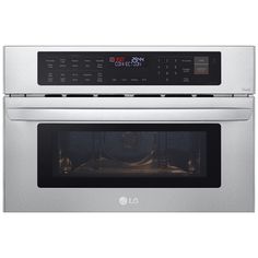 a stainless steel microwave oven with the door open and electronic controls on it's side