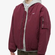 Brand New, With Tags, Never Been Used. Color - Night Maroon & White. Nike Takes Cues From Vintage Military Looks For Its Flight Jacket, Which Features A Traditional Bomber Silhouette. Nike’s Rendition Of This Classic Style Is Rugged And Utilitarian, With A Worn-In Aesthetic And A Zipped Sleeve Pocket To Complete The Look. As Part Of Nike’s Life Collection, This Relaxed Jacket Is Crafted With At Least 50% Sustainable Materials, Making It An Eco-Conscious Choice. Organic Cotton Outer Recycled Poly Red Nike Outerwear For Spring, Nike Red Outerwear With Pockets, Nike Long Sleeve Cotton Outerwear, Red Nike Outerwear With Pockets, Nike Flight, Military Looks, Flight Jacket, Vintage Military, White Nike