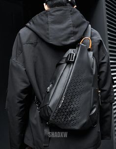 Type: Techwear bag Design: Techwear, Cyberpunk, Urban Material: Polyester Features: Multiple compartments, USB port, waterproof Size: 16.2*11*4.3" | 41*28*11cm Tactical Crossbody Bag Designed for the future, yet rooted in the now, it's an accessory every techwear enthusiast must possess. Crafted for those who traverse bustling city streets and digital realms alike, it offers a level of utility unparalleled by ordinary bags. The multiple compartments are thoughtfully organized, ensuring quick acc Techwear Nylon Shoulder Bag For Outdoor, Anti-theft Shoulder Bag For Outdoor Activities, Outdoor Techwear Backpack, Anti-theft Shoulder Chest Bag For Outdoor Activities, Black Techwear Chest Bag For Outdoor, Techwear Nylon Backpack, Techwear Outdoor Nylon Bag, Outdoor Techwear Nylon Bags, Techwear Nylon Bags For Outdoor