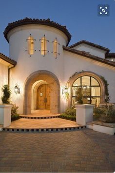 the front entrance to a home at night