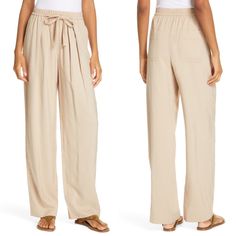 Vince Wide Leg Drawstring Waist Pants Latte Cream Light And Airy, These Comfy Drawstring-Waist Pants Hit The Trend-Right Mark With Minimal Effort Required. - Drawstring Elastic Waist - Side Pockets; Back Patch Pockets - 90% Viscose, 10% Polyamide - Pleated Front - High Waisted - Style V569121653 Women's Size Small Brand New With Tags! Approximate Measurements - Waist 13.25" Across - Rise 11.75" - Inseam 31" Neutral Summer Pants For Daywear, Neutral Summer Daywear Pants, Beige Wide Leg Pants For Summer Daywear, Summer Beige Wide Leg Daywear Pants, Silk Wide Leg Pants, Drawstring Waist Pants, Cream Pants, Linen Blend Pants, Black Cargo Pants