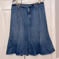 Ralph Lauren Denim Medium Wash Jean Flare Skirt Size 14 100% Cotton Mid Calf Length (Depending On Your Height) With A Flare At The Bottom Super Cute Styled With Boots For A Western Cowgirl Or Boho Look. New Without Tags. I Bought This At Macy’s And Never Wore It. Please Ask Any Questions You Might Have! Non-Smoking, Pet Free Home. Please Examine All Of The Photos For The Most Accurate Representation Of This Item. The Color Tone May Differ Slightly Due To The Lighting And The Perception Of The Ca Tan Midi Skirt, Seersucker Skirt, Skirts Flowy, Jean Skirts, Ralph Lauren Skirts, Midi Wrap Skirt, Silk Maxi Skirt, Animal Print Skirt, Jean Flare