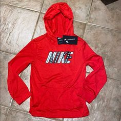 New Boys Hoodie Standard Fit Sz Xs (A001) Nike Hooded Tops With Adjustable Hood, Nike Hooded Top With Letter Print, Nike Sporty Hoodie With Graphic Print, Sporty Nike Hooded Top, Nike Sporty Hooded Top, Red Nike Hooded Top, Nike Long Sleeve Hoodie With Logo Print, Nike Zip Hoodie, Nike Tech Fleece Hoodie