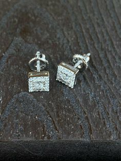 "mens or womens super iced out square stud earrings Solid 925 sterling silver! Not Plated Or Filled Wont turn your ears green! Diamond cut for a shiny look 1ct simulated diamonds Nice round stones! SUPER ICY...Must see in the sun! About 0.4\" (10mm) wide perfect small/medium size! Pair weighs around 1.8 grams Screw backs for a secure fit!" Silver Diamond Rectangular Earrings, Rectangular Silver Diamond Earrings, Sterling Silver Rectangular Earrings With Diamond Accents, Rectangular Sterling Silver Earrings With Diamond Accents, Rectangular Diamond Cut Sterling Silver Earrings, Womens Stud Earrings, Diamond Ice, Womens Earrings Studs, Man Made Diamonds