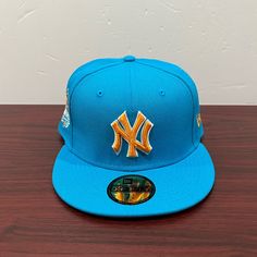 Brand - New Era Hat Model - 59fifty Hat Type - Fitted Team - New York Yankees Color - Blue & Orange Condition- Brand New Sizes Available; 7 1/8, 7 5/8 Blue Fitted Hat For Baseball Season Streetwear, Blue Fitted Hat For Baseball Season, Blue Fitted Hat With Flat Brim For Baseball Season, Blue Flat Brim Fitted Hat For Baseball Season, Sports Blue Snapback Hat With Flat Crown, Blue Snapback Fitted Hat For Baseball Season, Blue Snapback Hat With Flat Crown For Sports, Blue Flat Bill Hat For Streetwear, Blue Flat Bill Fitted Hat For Sports