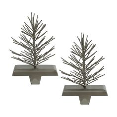 two metal trees sitting on top of each other