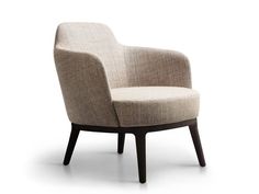 an upholstered chair with black legs and a light colored fabric on the back