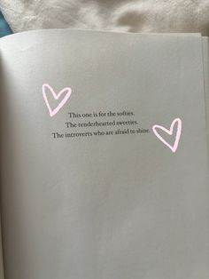 an open book with some pink hearts on it's cover and the words, this is for the softs