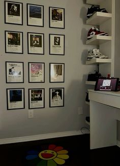 there are many pictures on the wall in this room and it is very nice to see