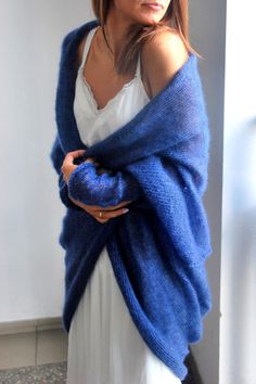 "Long navy blue mohair silk cardigan, soft mohair sweater, bridal blue mohair cardigan, wedding soft mohair cape, bridal lace mohair sweater This knitted sweater is my absolute love. This model is one of the most popular among our clients. Transparent knitwear will look great as a spring or summer image and even winter. :) To create this model, I used the yarn of the famous manufacturer Drops. It perfectly emphasizes the silhouette and line of the bust. The sweater is soft to the touch, is 75 mo Beige Kimono, Wedding Sweater, Bridal Sweater, Thick Knit Cardigan, Pull Mohair, Navy Blue Cardigan, Bridal Bolero, Oversized Knit Cardigan, Silk Cardigan