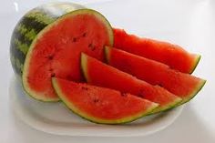 slices of watermelon on a white plate