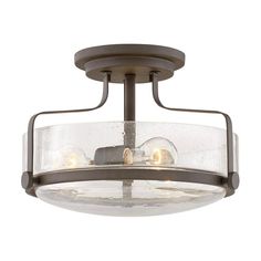 a semi flush ceiling light with two lights on it's sides and an open glass bowl