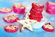 red and white cookies stacked on top of each other