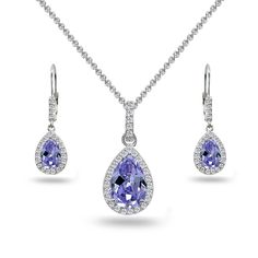 Wear this stylish set to enhance your daytime and evening attire. This beautiful jewelry set features dangling pear-cut stones in a white topaz encrusted halo design, for a dazzling evening look. The earrings measure 9.5mm in width & 11.6mm in length and the pendant measures 11.5mm in width & 25mm in length. This luxurious jewelry set is crafted of fine sterling silver. The pendant hangs from a 18 inch rolo chain and secures by a spring-ring clasp. This necklace and earrings set in fine Luxurious Jewelry, Halo Design, Topaz Jewelry, Women's Jewelry Sets, Necklace And Earrings Set, Leverback Earrings, Teardrop Necklace, 925 Silver Jewelry, Rolo Chain