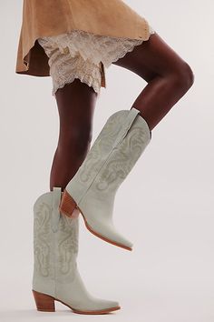 Stun in these so cool western-inspired boots from Jeffrey Campbell featuring classic embroidered details in a luxe leather design with a pointed toe and block heel. Pull-on styleCushioned insoleClassic rounded edgePull tabs on either side | Dagget Western Boots by Jeffrey Campbell at Free People in Blue, Size: US 7.5 Embroidered Cowgirl Boots, Upcoming Fashion Trends, Suede Fashion, Blue Fits, White Heels, Embroidered Details, Ranch Style, Mid Calf Boots, Cowgirl Boots