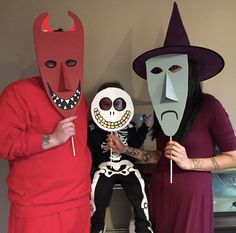 three people dressed up in halloween costumes