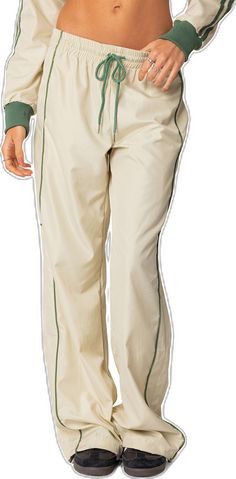 Sporty Khaki Bottoms For Spring, Khaki Athleisure Bottoms For Streetwear, Khaki Athleisure Bottoms For Spring, Sporty Khaki Parachute Pants For Spring, Spring Sporty Khaki Parachute Pants, Khaki Athleisure Pants For Streetwear, Sporty Khaki Cargo Pants For Spring, Sporty Spring Khaki Cargo Pants, Sporty Khaki Cargo Pants