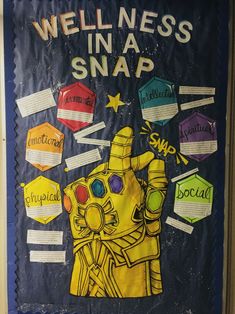 a bulletin board with an image of a yellow robot holding up the words wellness snap