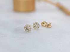 14k Solid Gold Mini Circle Earrings, Dainty CZ Pavé Diamond Cluster Studs, Small Real Gold Round Button Earrings, Tiny Second Hole Piercing, Minimalistic Everyday Earrings These dainty Pavé  Diamond Button Stud Earrings are handcrafted from 14k solid and high-grade Cubic Zirconia. Their cute and minimalistic design is perfect for adding a pop of sweetness to your everyday look.  ★PLEASE NOTE: A SIGNATURE WILL BE REQUIRED UPON DELIVERY FOR ALL ORDERS OVER $100 (before tax)★ ❤ MATERIALS * 14k solid gold * Choice of gold color: Yellow or White  * Stones: Cubic Zirconia * Each Single earring comes with one earring pushback, 14k solid gold. * Each pair of earrings comes with one pair of earring pushbacks, 14k solid gold. * White gold jewelry pieces feature a highly polished rhodium finish PAIR= Gold Cluster Earrings With Halo Setting For Wedding, Gold Cluster Earrings For Anniversary, Yellow Gold Cluster Earrings For Anniversary, Gold Cluster Earrings With Halo Setting As Gift, Round Cluster Earrings With Diamond Accents As Gift, Gift Cluster Earrings With Diamond Accents, Gift Round Cluster Earrings With Diamond Accents, Gold Halo Design Cluster Earrings, Cluster Yellow Gold Earrings For Gifts