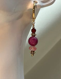 "Strawberry Fields (3)" A Gold-Plated Flared Lever back Earring holding, Ruby Crazy Lace Agate (w/natural occurring design), Faceted Pink Quartz, deep Red Carnelian beads & tiny Vermeil Gear Beads. These Beautiful beads give this earring a majestic look of sparkle and color!  1.25" Dangle Length Ruby Crazy Lace Agate is color enhanced. Red Carnelian, Unique Jewelry Gifts, Strawberry Fields, Carnelian Beads, Red Earrings, Crazy Lace Agate, Pink Quartz, Lace Agate, Deep Red