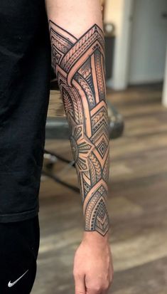 a person with a tattoo on their arm