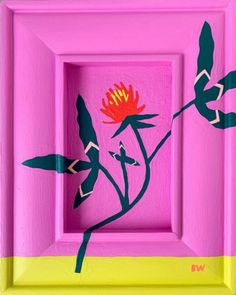 a pink and yellow frame with flowers painted on it