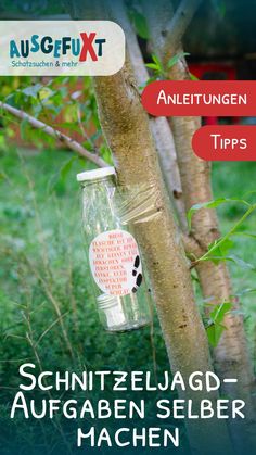 a jar hanging from a tree with the words, schnitzellaud - au