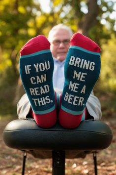 a man sitting in a chair with his feet up