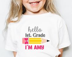 The perfect t-shirt to wear on the 1st day of school and also the rest of the year. Super soft and high-quality shirt. HOW TO ORDER 1. Check the size chart. 2. Choose size. 4. Select the quantity. 5. Click 'Add to Cart.' 6. Repeat all the steps until you have all the shirts you need. 7. Proceed to checkout. Are you wondering what makes our t-shirt so great? - 100% preshrunk cotton - which means won't shrink after the first wash. - It's 4.2 oz. - for that perfect lightweight feel. - It has a retail fit which gives it a fashion-forward feel unisex sizing - great for all gender and all sizes.  We have more Back to School designs available, please check our main webpage:  https://www.etsy.com/shop/MimisAndCo If you have any questions please ask us, we are happy to help. White T-shirt With Funny Text For School, White Funny Text Shirt For School, White Top With Funny Text For School, White Tops With Funny Text For School, White Shirt With Funny Text For School, White Shirt With Name Print For School Events, White T-shirt For End Of School Year Events, First Day Of First Grade, Kindergarten Outfit