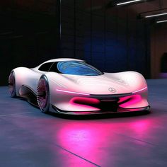 a futuristic car is shown with pink lights