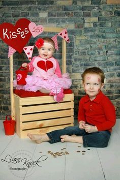 two children are posing for a photo in their valentine's day photoshoots