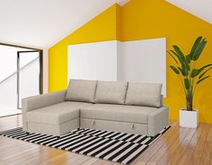 a living room with yellow walls and black and white striped rugs on the floor