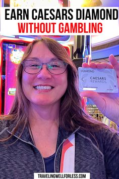 a woman holding up a card with the words earn caesars diamonds without gambling